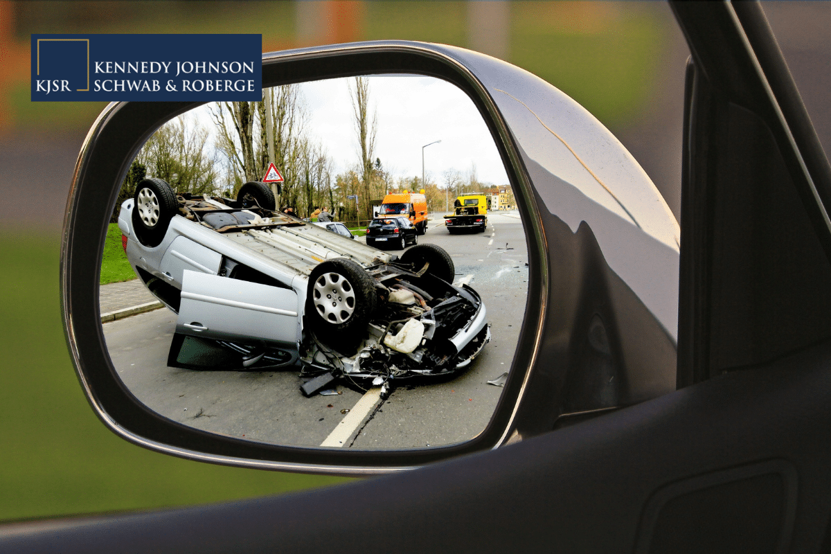 a car flipped upside down after an accident