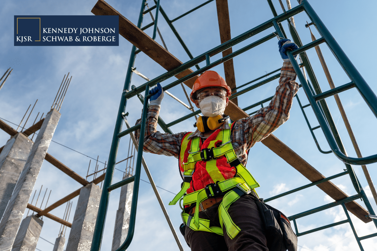 a construction worker climbing scaffolding